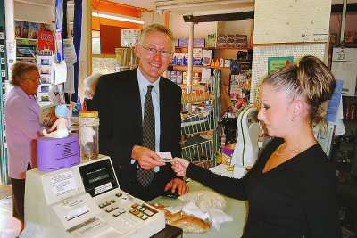 Norman Lamb MP being served by Holly Turner Oct 2003